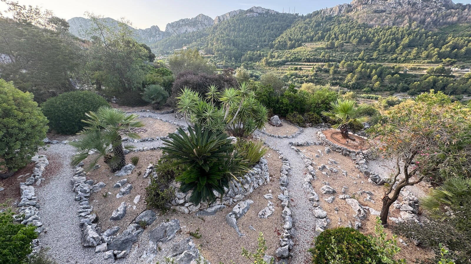 Back mediterranean garden bordering on the valley - you may see the occasional goat herd passing by Back mediterranean garden bordering on the valley - you may see the occasional goat herd passing by
