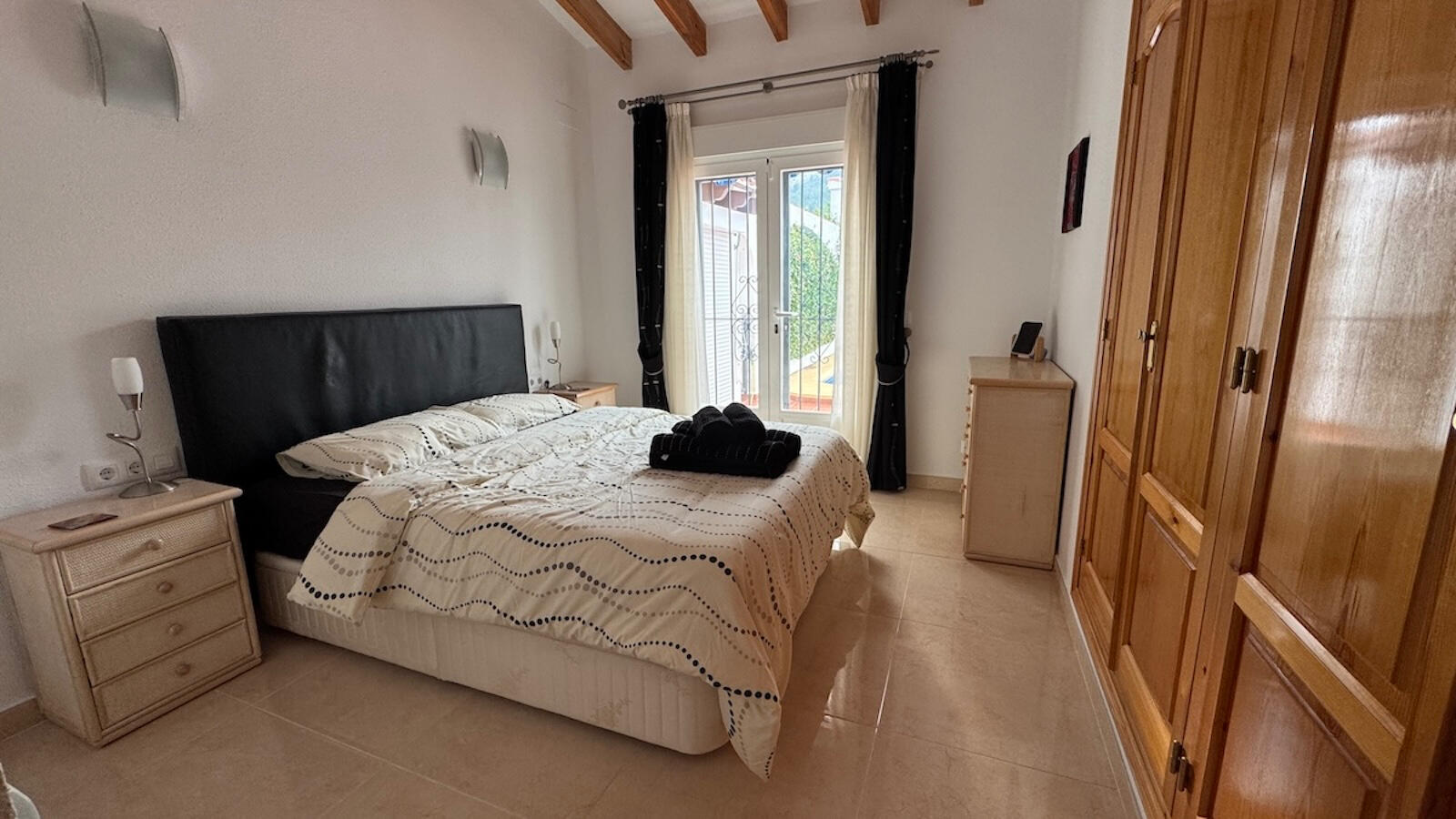 Main ensuite bedroom with direct terrace and pool access Main ensuite bedroom with direct terrace and pool access